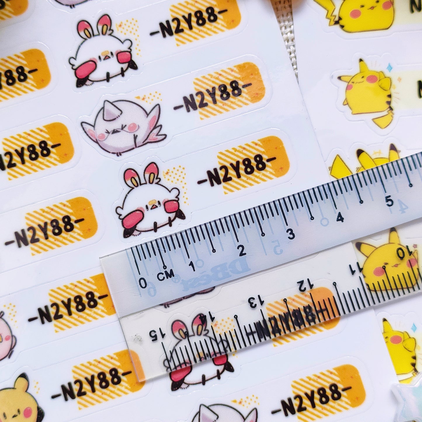 Customisable: Waterproof, Durable and Repositionable: Poketama Name Stickers